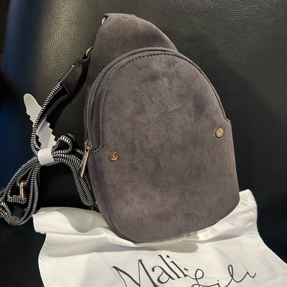 NWT suede sling / crossbody bag with storage bag